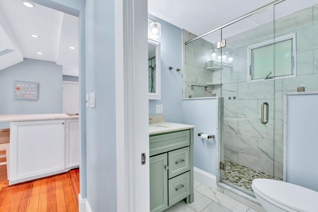 Bathroom, Glass Shower, Interior, Marble, Marble Walls, Recessed Lighting, Wood Texture Flooring