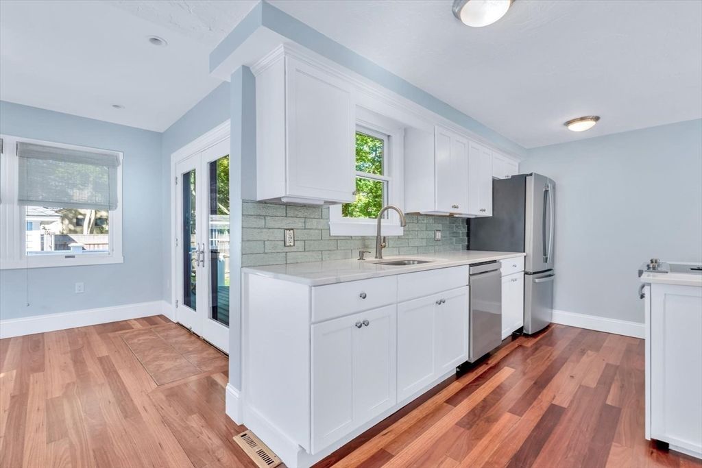 Interior, Kitchen, Recessed Lighting, Tile Countertops, Wood Texture Flooring