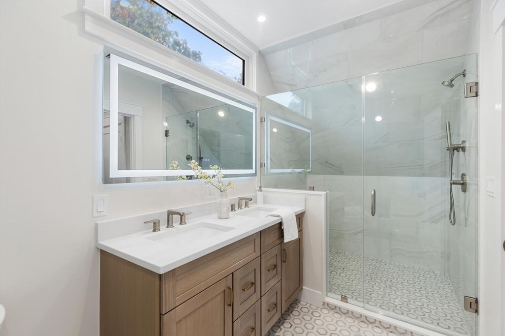 Bathroom, Dual Sink Vanities, Glass Shower, Interior, Marble Walls, Recessed Lighting
