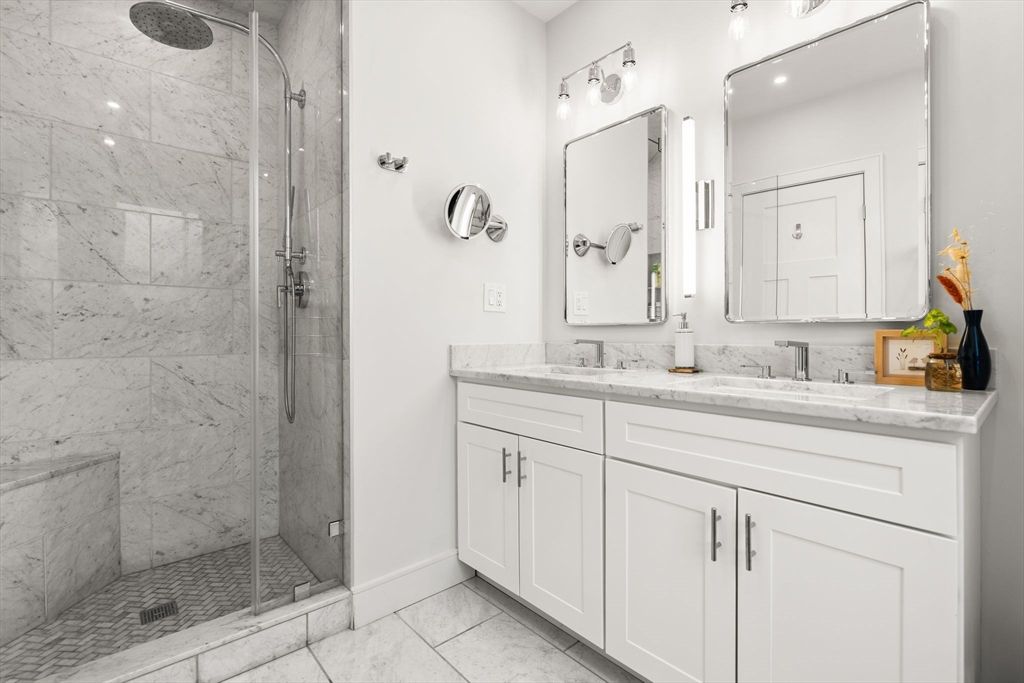Bathroom, Dual Sink Vanities, Glass Shower, Interior, Marble Walls, Recessed Lighting