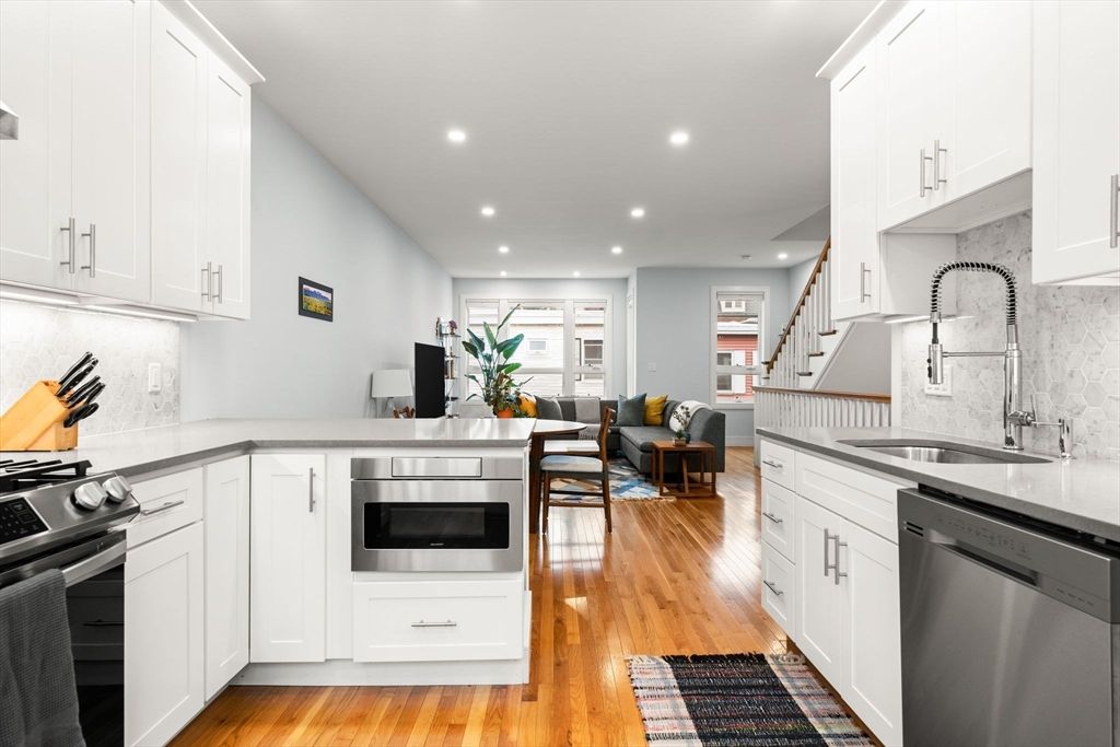 Dining room, Interior, Kitchen, Living room, Recessed Lighting, Stainless Steel Appliances, Wood Texture Flooring