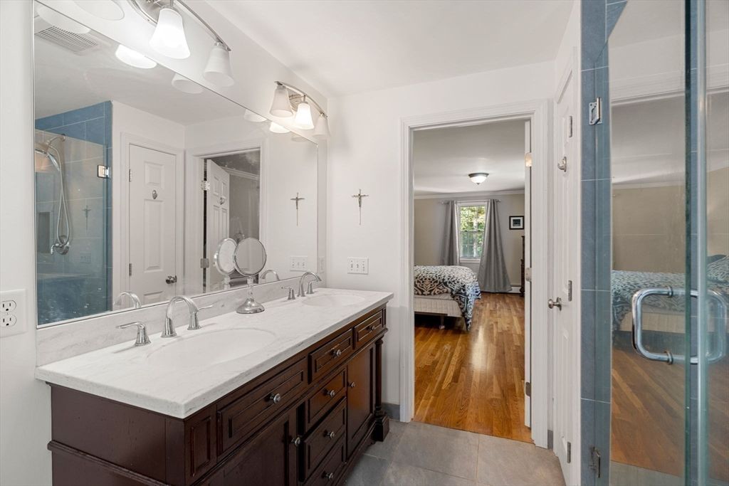 Bathroom, Dual Sink Vanities, Glass Shower, Interior, Wood Texture Flooring