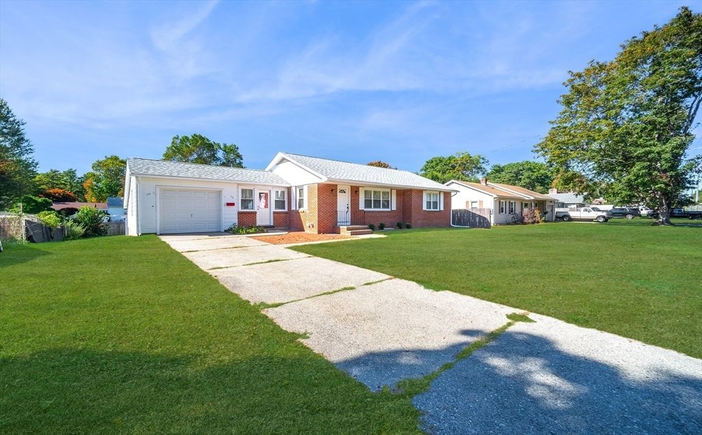 Attached, Backyard, Exterior, Facade, Brick Facade, Ranch