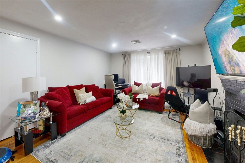 Fireplace, Interior, Living room, Recessed Lighting, Wood Texture Flooring