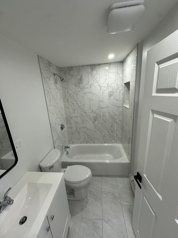 Bathroom, Dual Sink Vanities, Interior, Marble, Marble Walls, Recessed Lighting