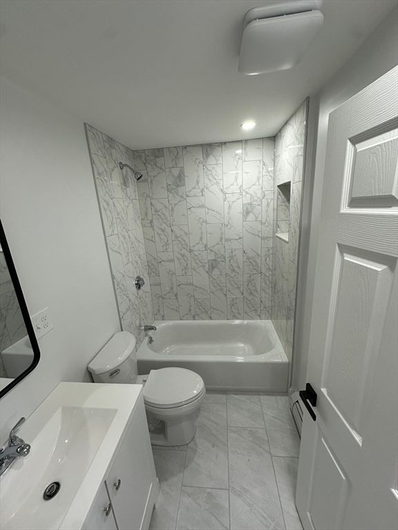 Bathroom, Dual Sink Vanities, Interior, Marble, Marble Walls, Recessed Lighting