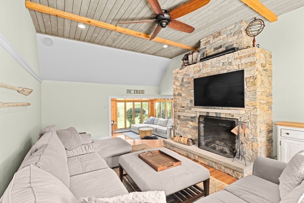 Fireplace, Interior, Living room, Recessed Lighting, Stone Walls, Wood Texture Flooring
