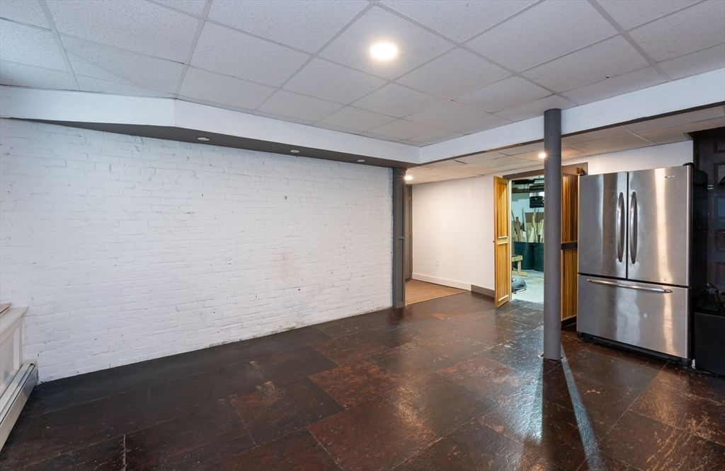 Empty room, Interior, Kitchen, Recessed Lighting, Stainless Steel Appliances, Stone Walls