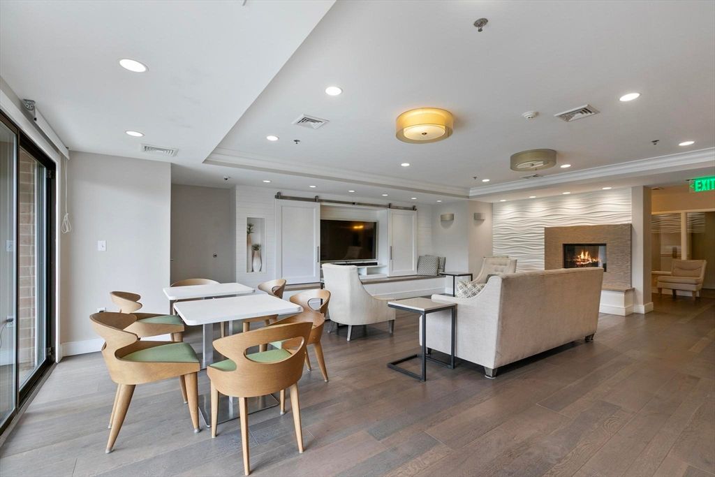 Dining room, Fireplace, Interior, Living room, Recessed Lighting, Wood Texture Flooring