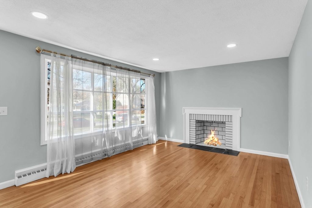 Empty room, Fireplace, Interior, Recessed Lighting, Wood Texture Flooring