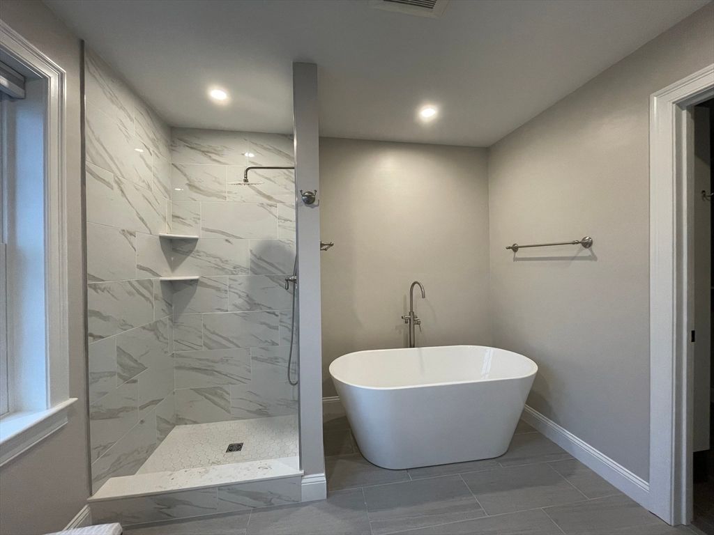 Bathroom, Free Standing Baths, Glass Shower, Interior, Marble Walls, Recessed Lighting