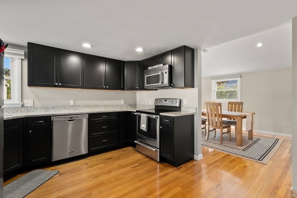 Dining room, Interior, Kitchen, Recessed Lighting, Stainless Steel Appliances, Wood Texture Flooring