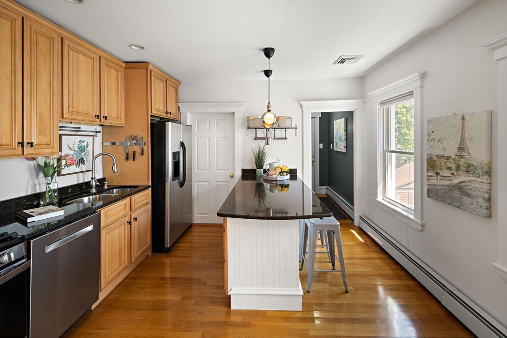 Dining room, Interior, Kitchen, Pendant Lights, Recessed Lighting, Stainless Steel Appliances, Wood Texture Flooring