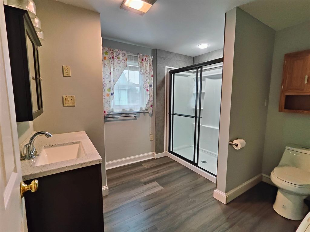 Bathroom, Glass Shower, Interior, Recessed Lighting, Wood Texture Flooring