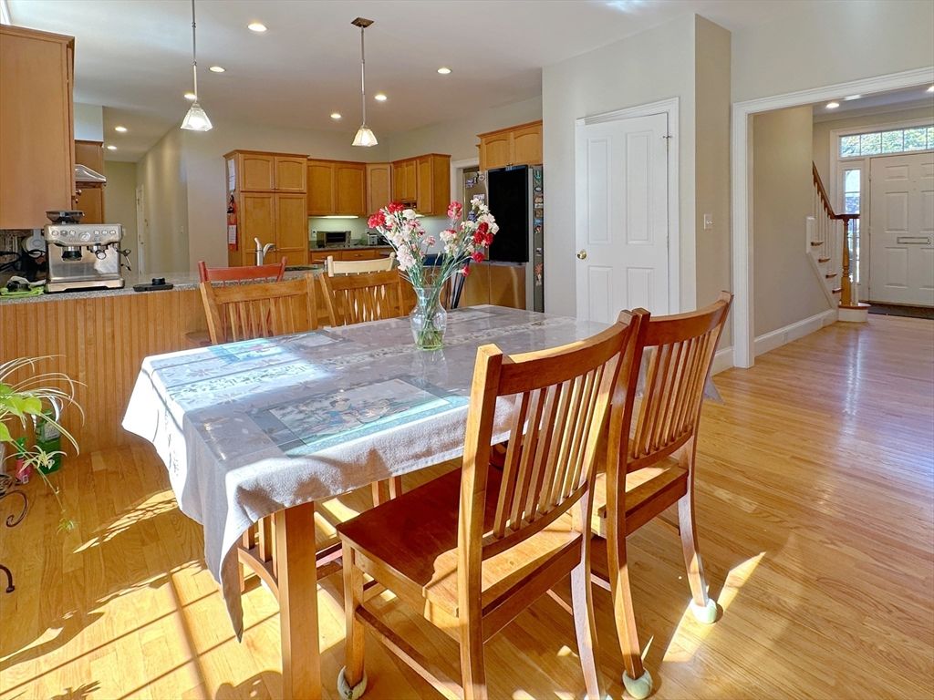 Dining room, Interior, Kitchen, Pendant Lights, Recessed Lighting, Stainless Steel Appliances, Wood Texture Flooring