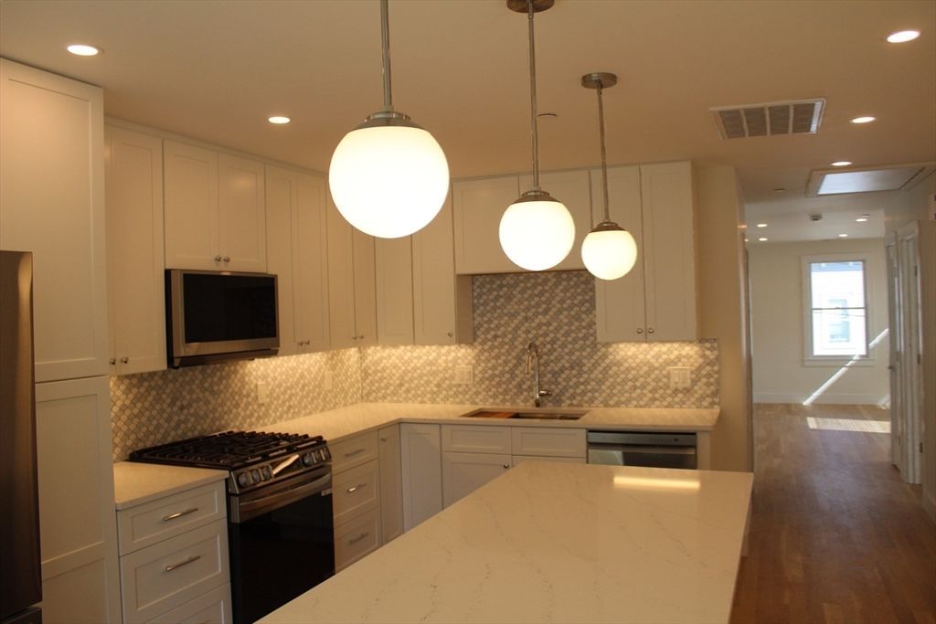 Interior, Kitchen, Pendant Lights, Recessed Lighting, Stainless Steel Appliances, Wood Texture Flooring