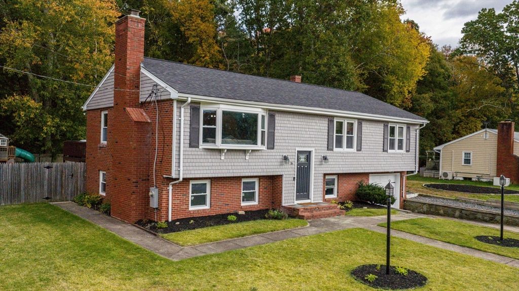 Exterior, Facade, Brick Facade, Raised Ranch