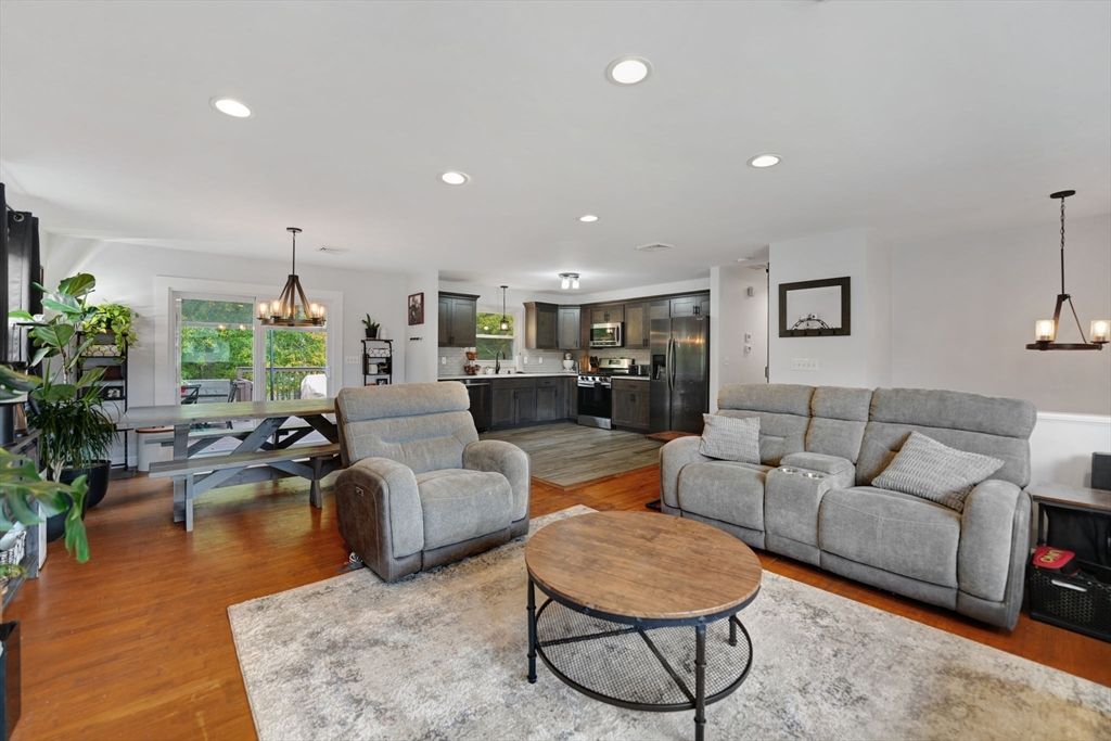 Dining room, Interior, Kitchen, Living room, Pendant Lights, Recessed Lighting, Stainless Steel Appliances, Wood Texture Flooring