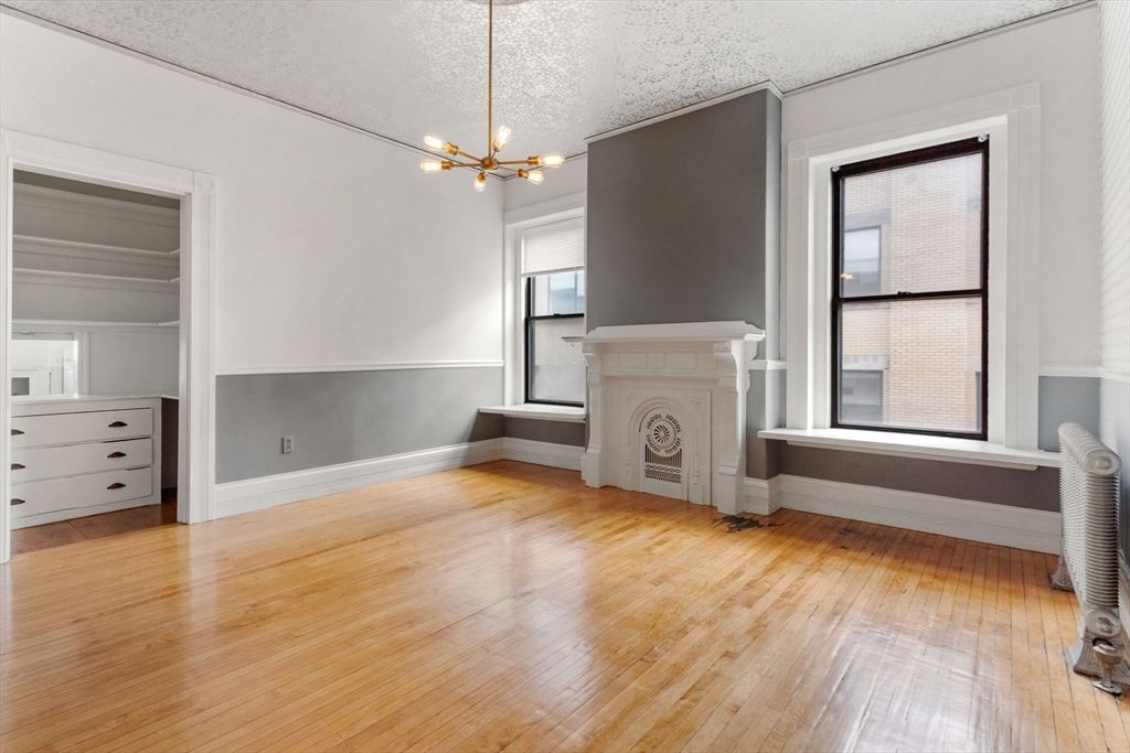 Empty room, Fireplace, Interior, Pendant Lights, Wood Texture Flooring