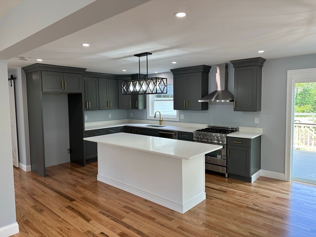 Chandelier, Interior, Kitchen, Pendant Lights, Recessed Lighting, Stainless Steel Appliances, Wood Texture Flooring