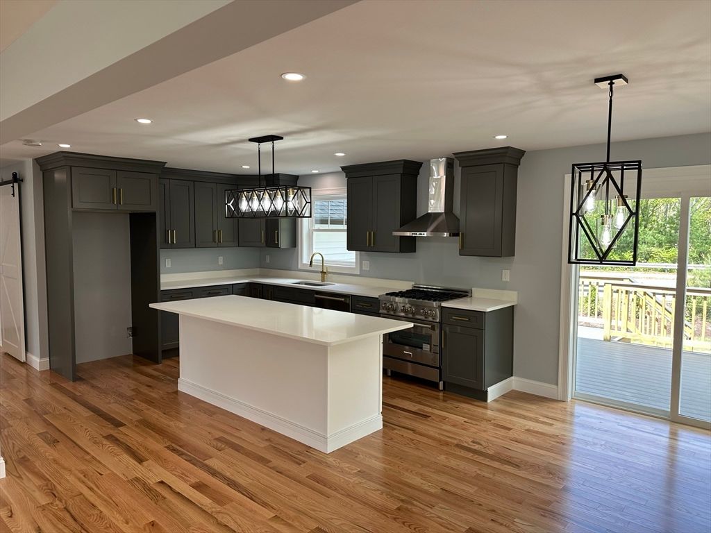 Chandelier, Interior, Kitchen, Pendant Lights, Recessed Lighting, Stainless Steel Appliances, Wood Texture Flooring