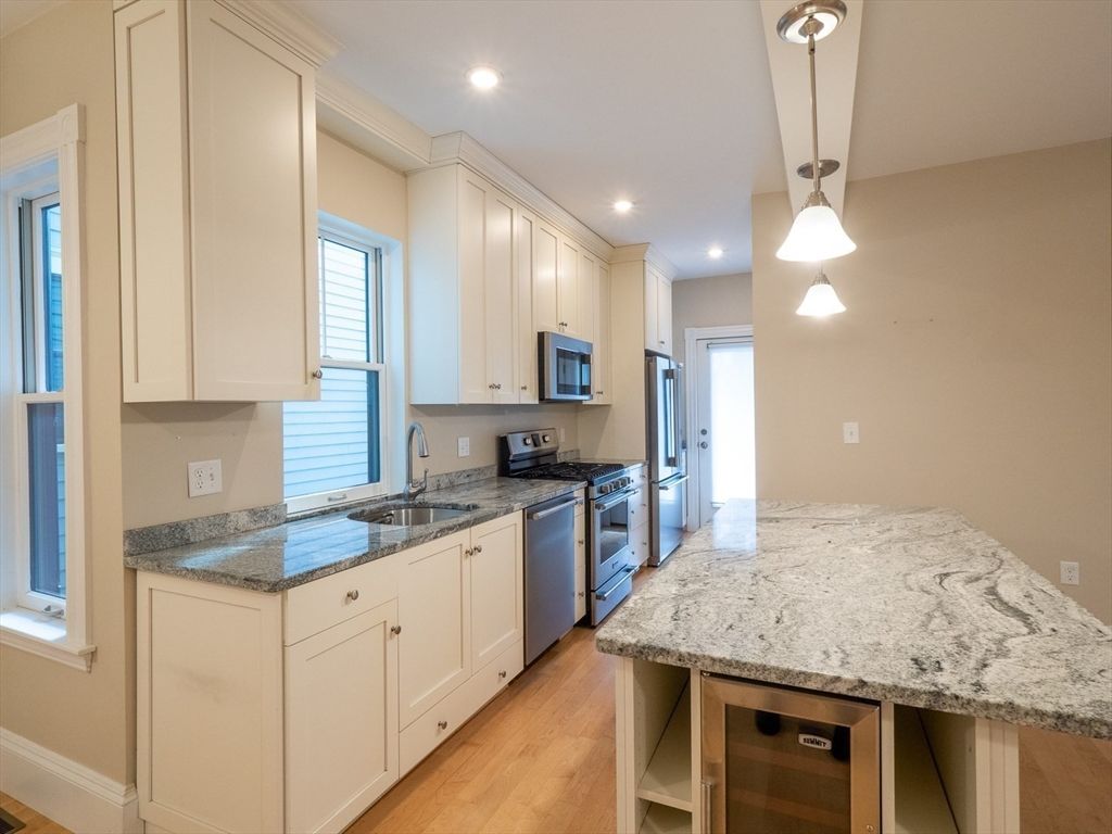 Interior, Kitchen, Pendant Lights, Recessed Lighting, Stainless Steel Appliances, Wood Texture Flooring