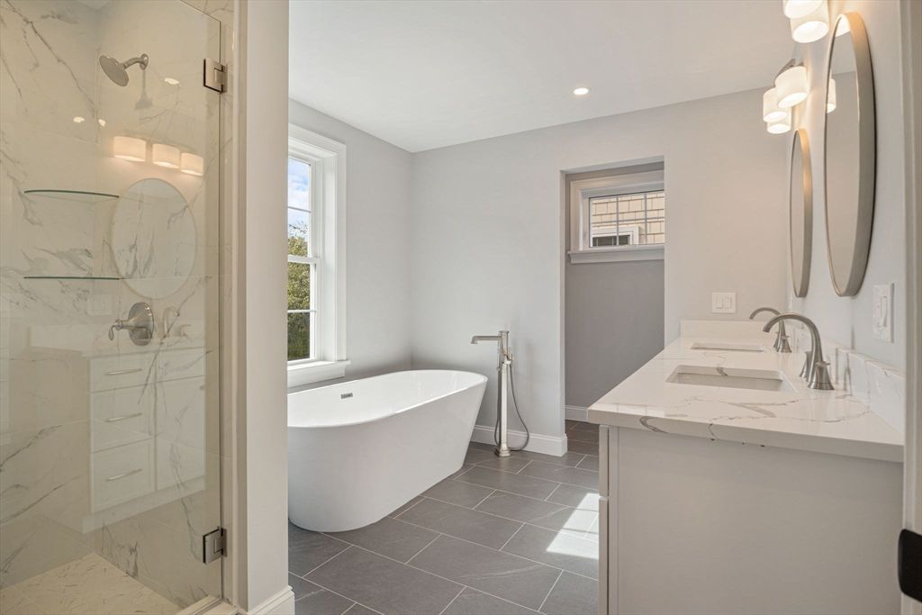 Bathroom, Dual Sink Vanities, Free Standing Baths, Glass Shower, Interior, Marble Walls, Recessed Lighting