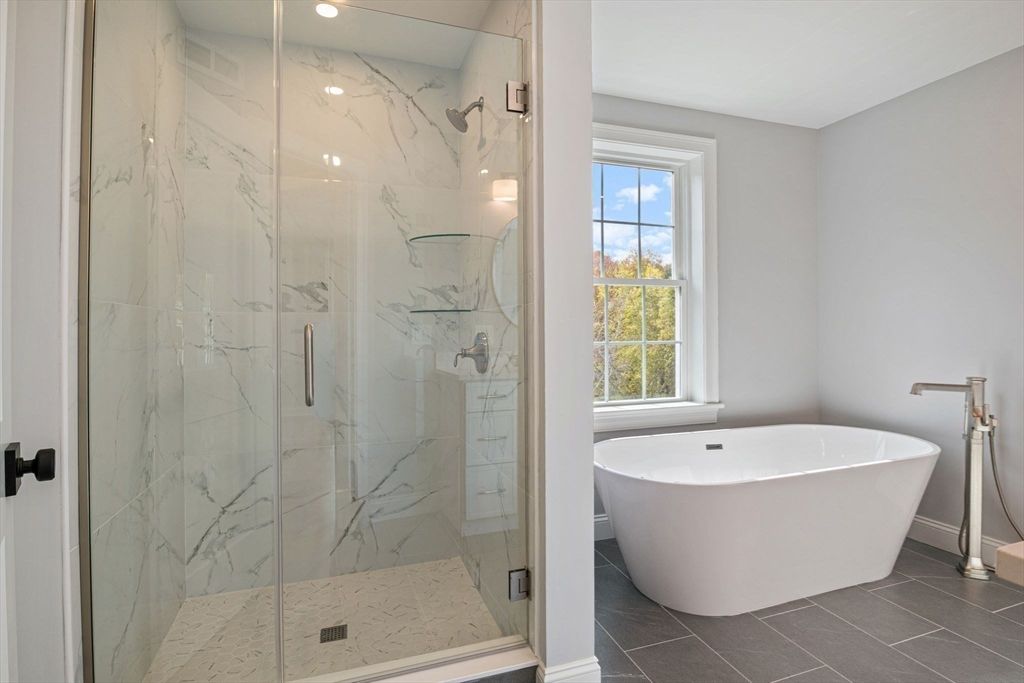 Bathroom, Free Standing Baths, Glass Shower, Interior, Marble Walls, Recessed Lighting