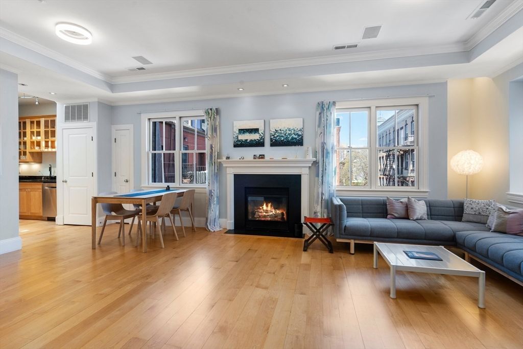 Dining room, Fireplace, Interior, Living room, Recessed Lighting, Wood Texture Flooring