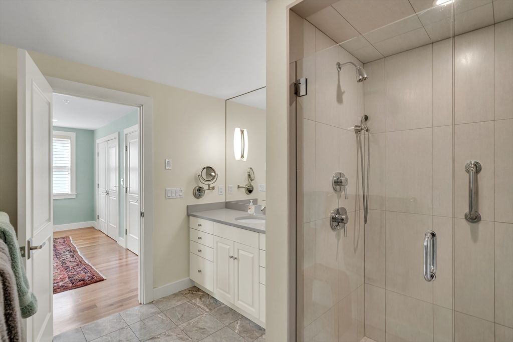 Bathroom, Dual Sink Vanities, Glass Shower, Interior, Wood Texture Flooring