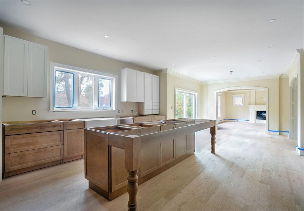 Empty room, Fireplace, Interior, Kitchen, Recessed Lighting, Wood Texture Flooring