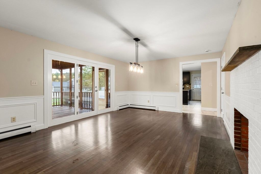 Empty room, Fireplace, Interior, Pendant Lights, Stone Walls, Wood Texture Flooring