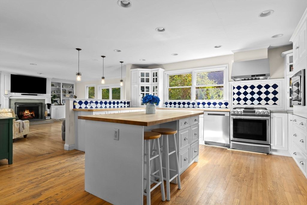 Fireplace, Interior, Kitchen, Pendant Lights, Recessed Lighting, Stainless Steel Appliances, Wood Texture Flooring