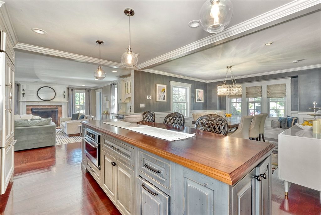 Chandelier, Dining room, Fireplace, Interior, Kitchen, Living room, Pendant Lights, Recessed Lighting, Wood Texture Flooring