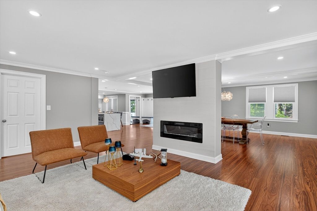 Chandelier, Dining room, Fireplace, Interior, Living room, Recessed Lighting, Wood Texture Flooring