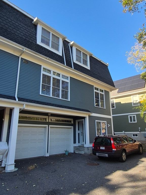 Attached, Exterior, Facade, Solar Panels, Rowhouse