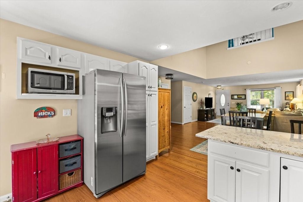 Dining room, Interior, Kitchen, Recessed Lighting, Stainless Steel Appliances, Wood Texture Flooring