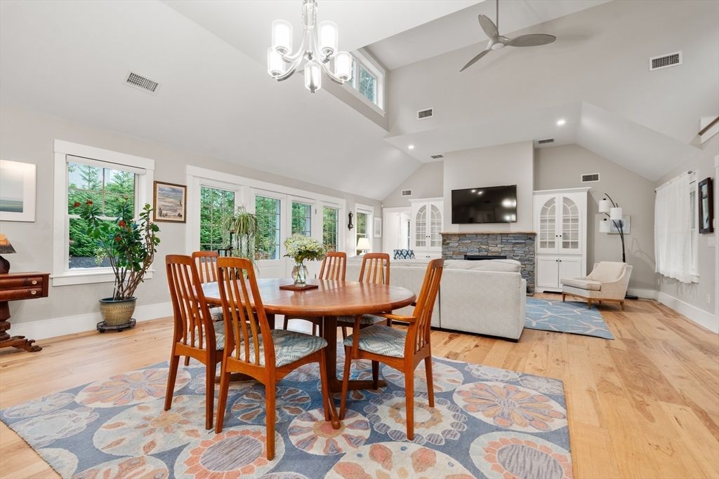 Dining room, Fireplace, Interior, Living room, Recessed Lighting, Wood Texture Flooring