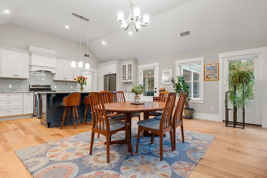 Chandelier, Dining room, Interior, Kitchen, Pendant Lights, Recessed Lighting, Stainless Steel Appliances, Wood Texture Flooring