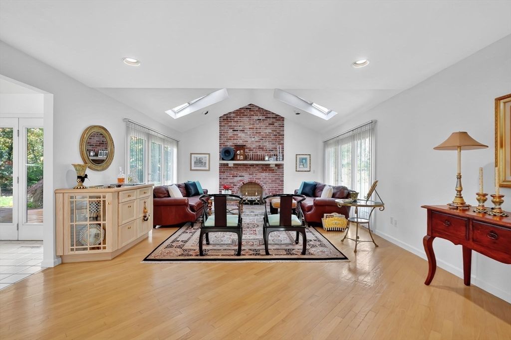 Fireplace, Interior, Living room, Recessed Lighting, Stone Walls, Wood Texture Flooring