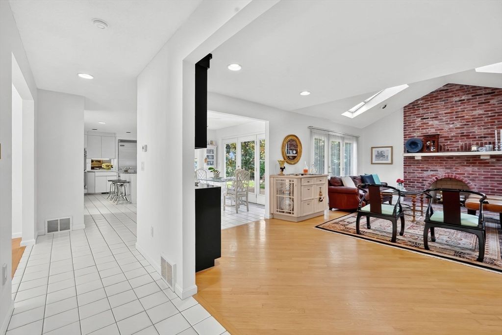 Dining room, Fireplace, Interior, Kitchen, Living room, Recessed Lighting, Stone Walls, Wood Texture Flooring