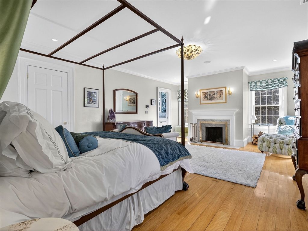 Bedroom, Chandelier, Fireplace, Interior, Recessed Lighting, Wood Texture Flooring