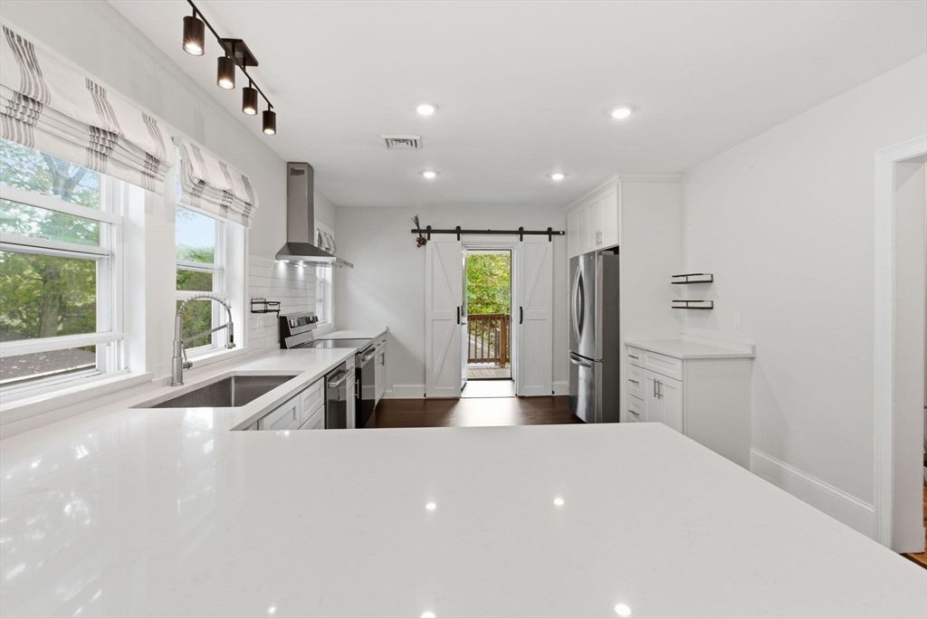 Interior, Kitchen, Recessed Lighting, Stainless Steel Appliances, Wood Texture Flooring