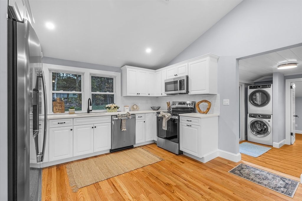 Interior, Kitchen, Recessed Lighting, Stainless Steel Appliances, Washer, Wood Texture Flooring