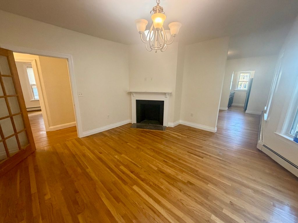 Chandelier, Empty room, Fireplace, Interior, Wood Texture Flooring
