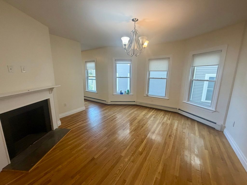 Chandelier, Empty room, Fireplace, Interior, Wood Texture Flooring