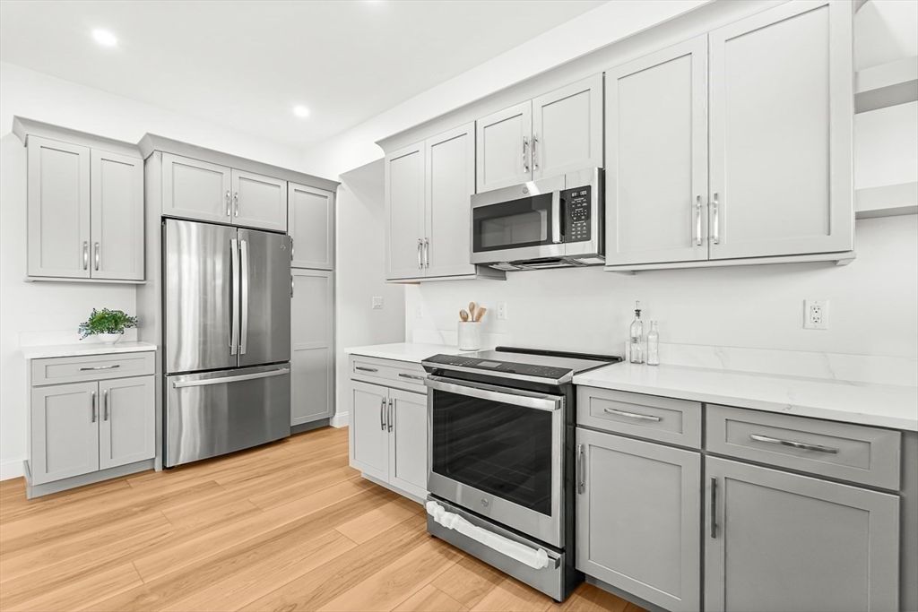 Interior, Kitchen, Recessed Lighting, Stainless Steel Appliances, Wood Texture Flooring