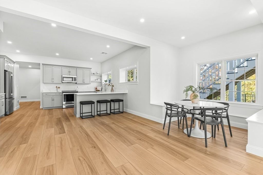 Dining room, Interior, Kitchen, Recessed Lighting, Stainless Steel Appliances, Wood Texture Flooring