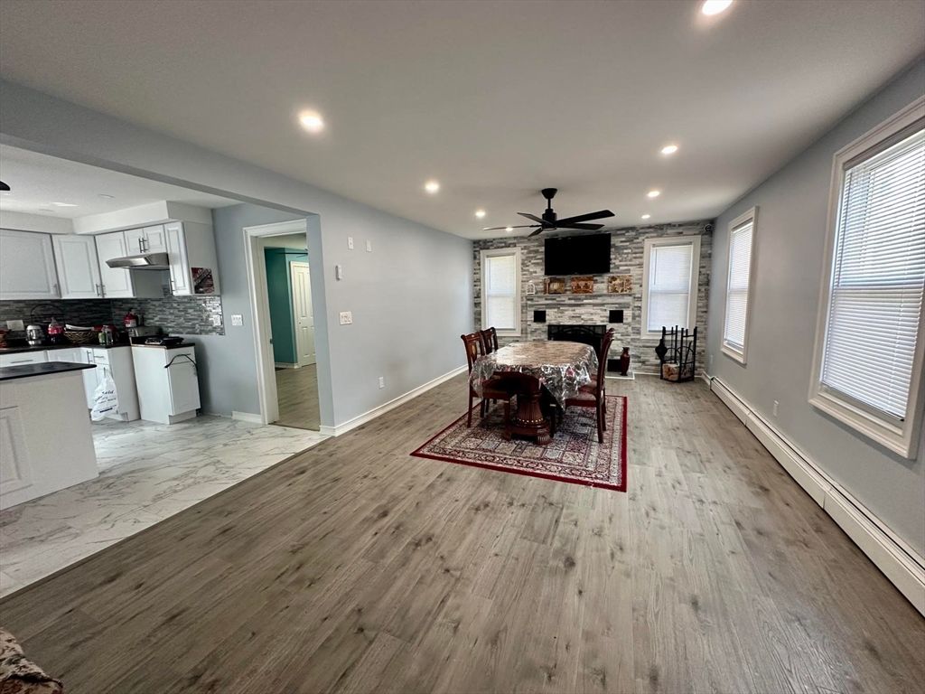 Dining room, Fireplace, Interior, Kitchen, Marble, Recessed Lighting, Stone Walls, Wood Texture Flooring