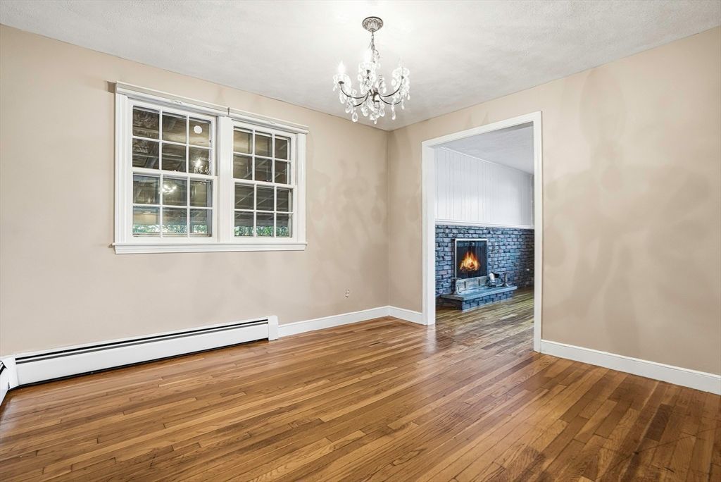 Chandelier, Empty room, Fireplace, Interior, Wood Texture Flooring
